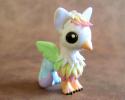 19397_pastel_rainbow_gryphon_by_dragonsandbeasties-d4icsr6.