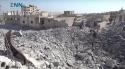 27407_Idlib__Regime_extermination_bombing_leaves_behind_a_huge_crater_in_Saraqib__Albraa_-01.