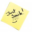 34548422676-sticky-note-reads-just-smile.