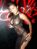 37302_Latin_woman_in_black_see-through_outfit_and_thongs.