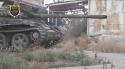 42173_Daraa__Moataz_Bellah_tank_targeting_enemy_forces_on_the_Atman_front__Moataz_-01.