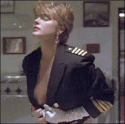 58143_celeb_erika_eleniak_tits.