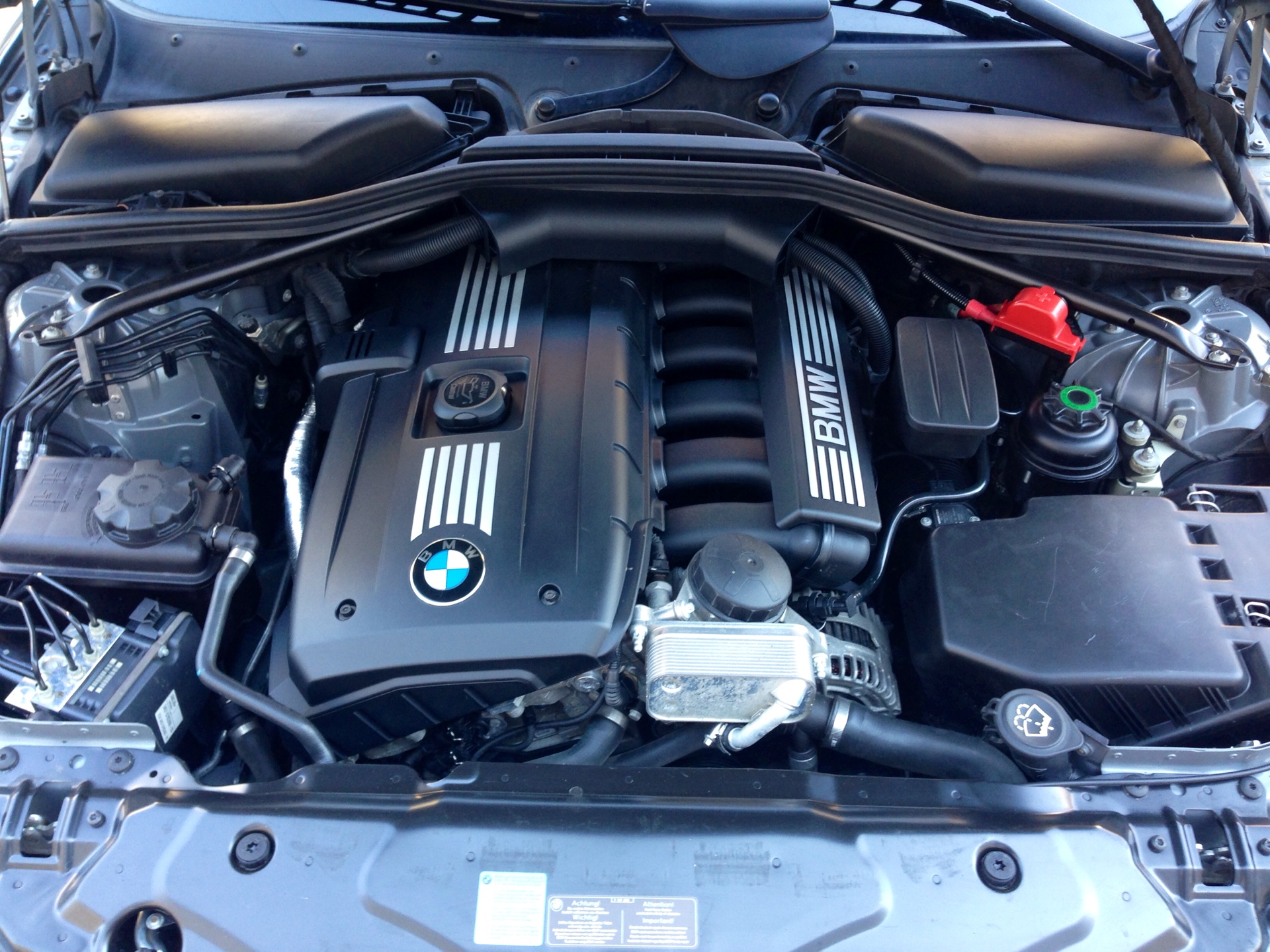 bmw e60 какой двигатель надежней